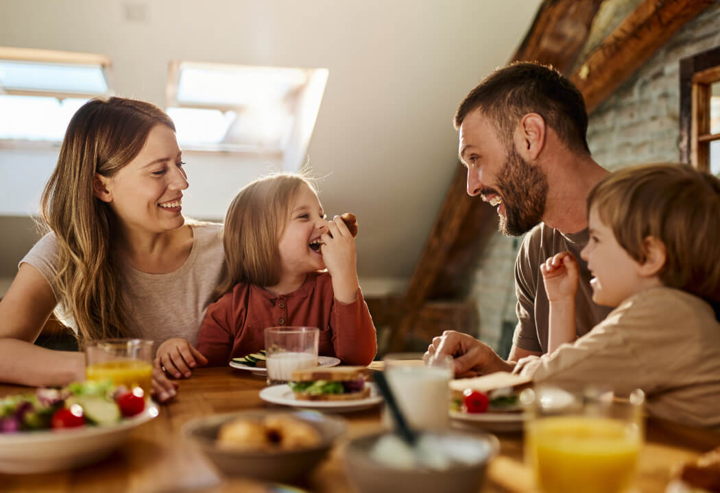 Young family eating breakfast